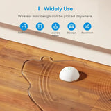 A white ball on a wooden floor