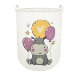 a white storage basket with a cartoon animal holding balloons