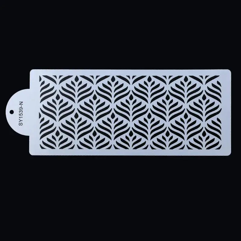 a white and black cutting board with a pattern on it