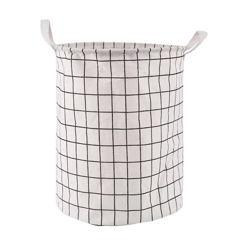 the white and black plaid laundry basket is shown with a black and white check pattern