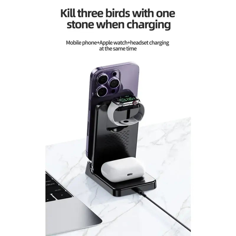 A white and black phone stand with a laptop on it