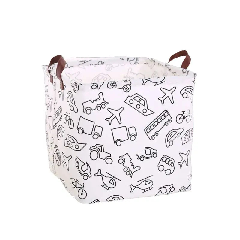 the white and black toy storage bag with a pattern of toys