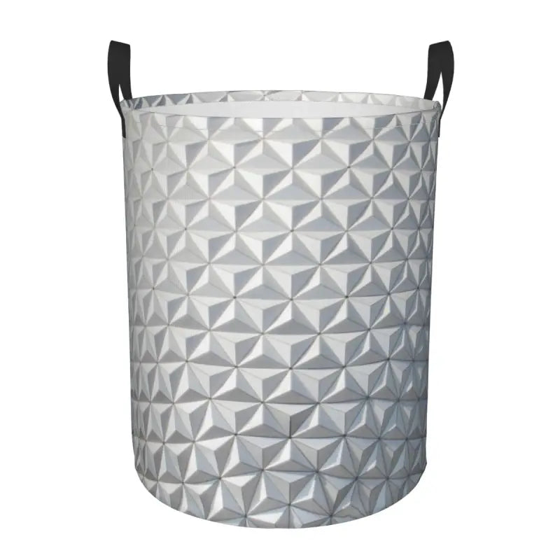 a white and black metal trash can with geometric design
