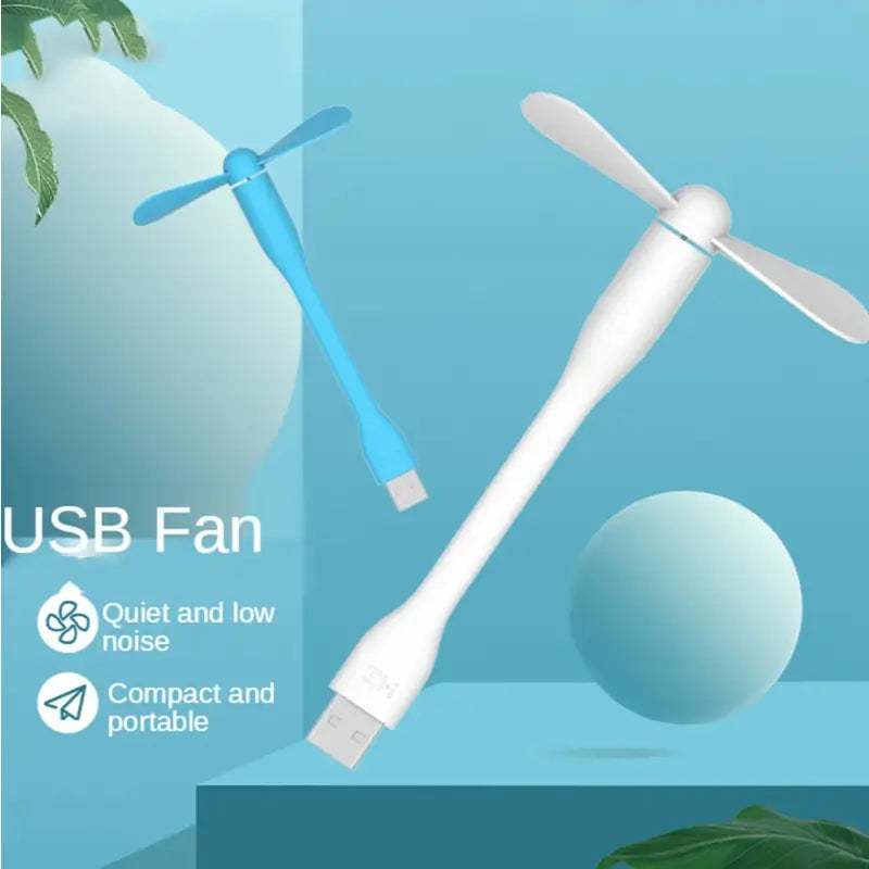 a white and blue fan with a plant in the background