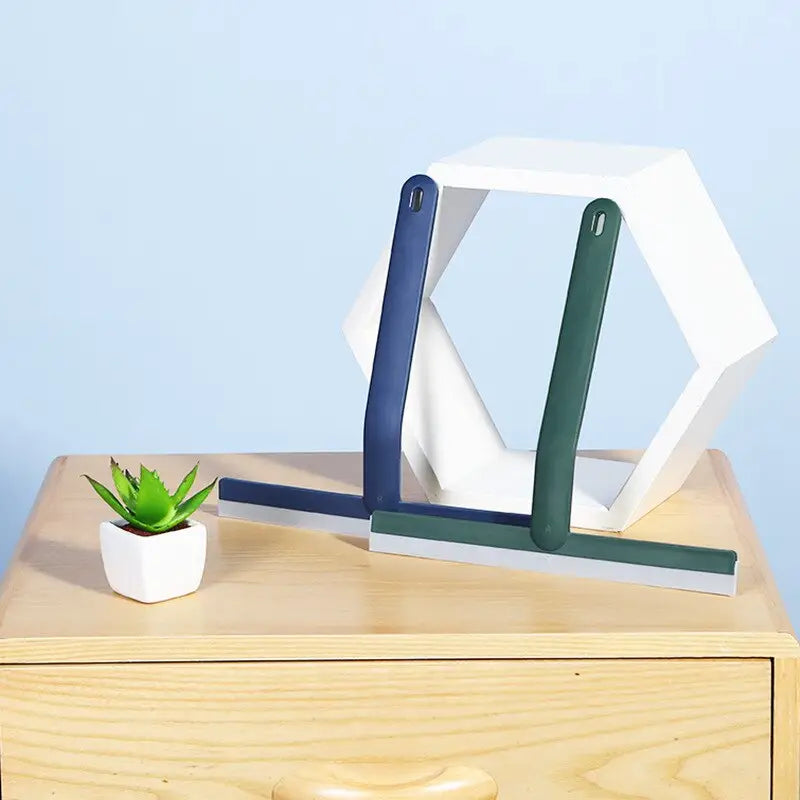 a white and blue geometric shaped object on a wooden table