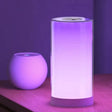 a white and blue light on a table