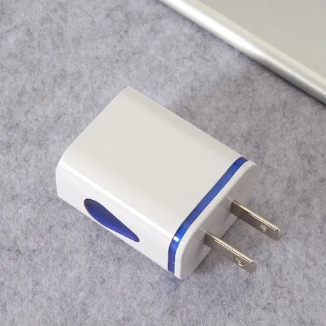 a white and blue usb with a white cord