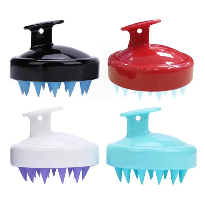 a set of three plastic hair brushers