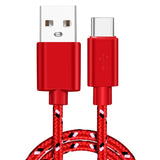 a red braided usb cable with a white background