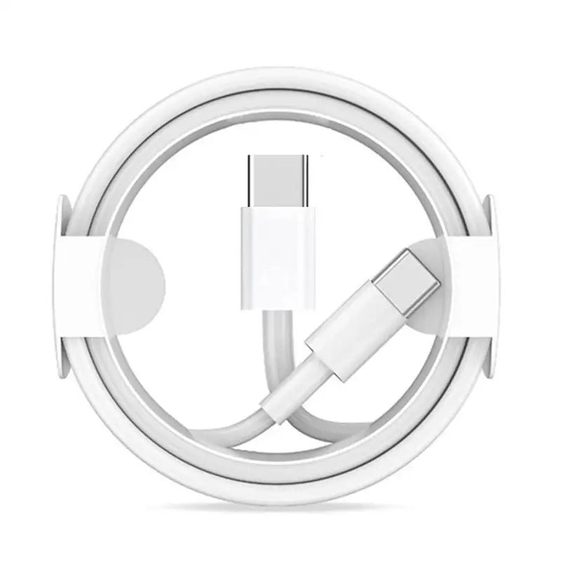 a white usb cable connected to an apple watch