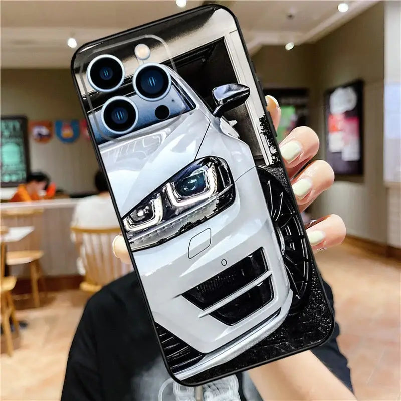 a white car phone case with a camera attached to it