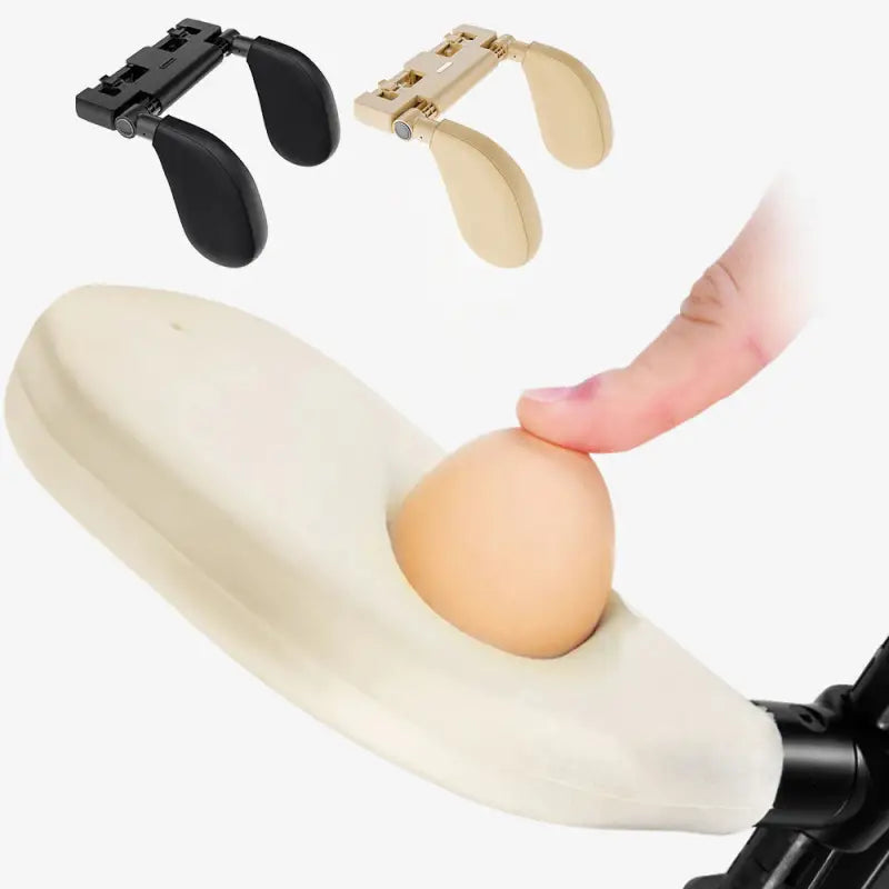 a hand holding an egg in a white egg holder