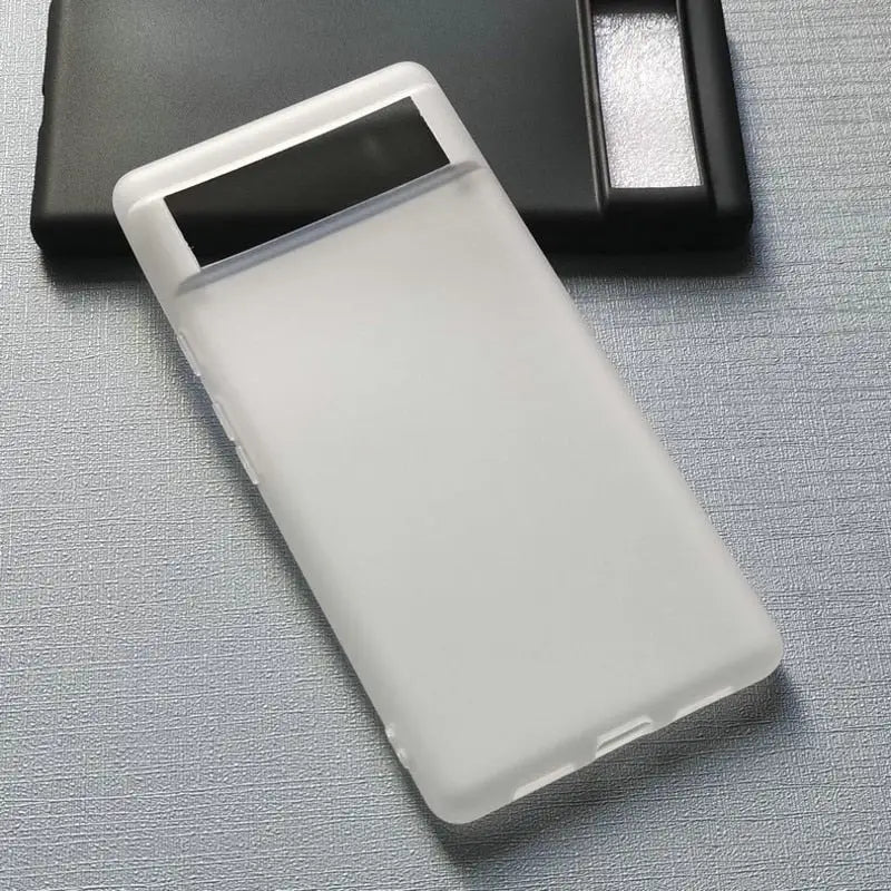 a white plastic case with a black plastic cover