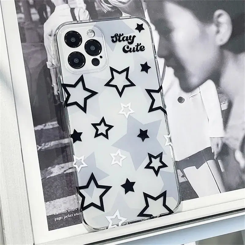 a white case with black stars on it