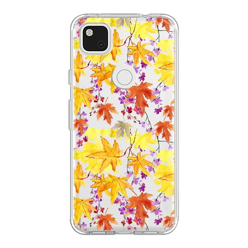 the back of a white case with colorful leaves