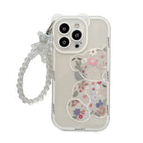 the case is made from clear plastic and features a floral design