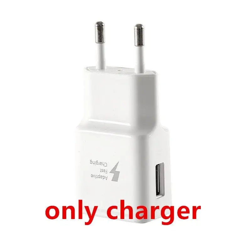 a close up of a white charger with a red text on it