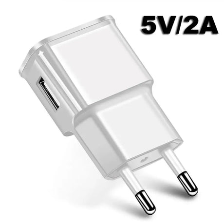 a white charger with a 5v 2a output and a usb cable