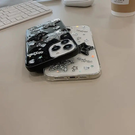 a white desk with a computer, keyboard and a phone