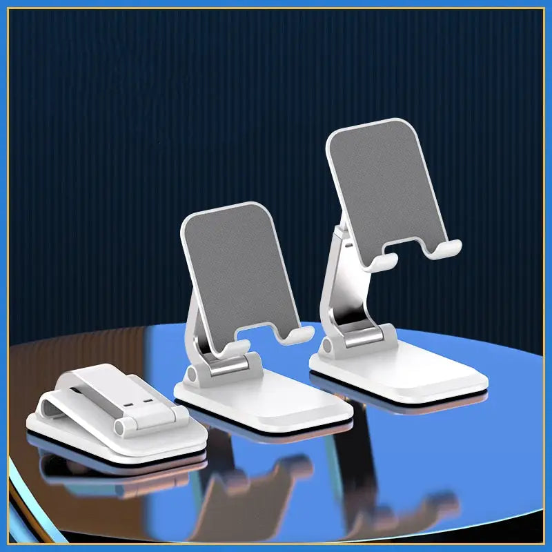 two white computer stands on a blue table