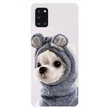 A white dog wearing a grey sweater phone case