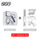 White earbuds with charging case and cleaning pen.
