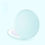 a white egg on a blue background