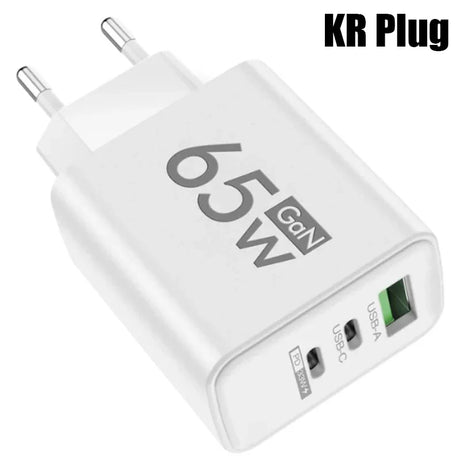 White electrical adapter with multiple USB ports and ’65W GaN’ branding.