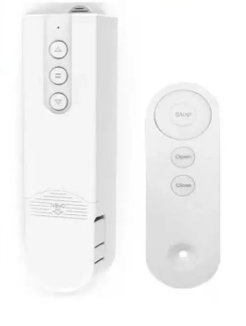 White electronic device with three buttons and a separate remote control.