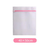 a white envelope with pink zipper
