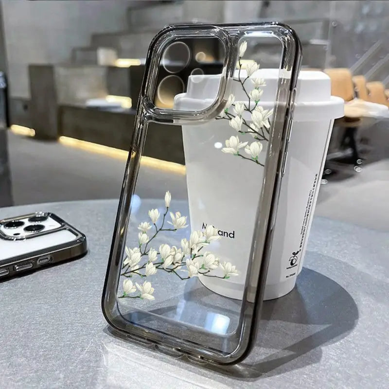 a white flower phone case on a counter