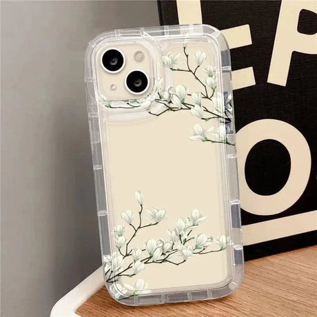 A white flower phone case on a wooden table