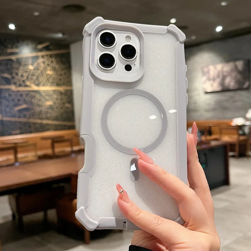 A white glittery phone case with a grey bumper and a circular magnet on the back.