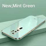 a white and gold case with the words new green