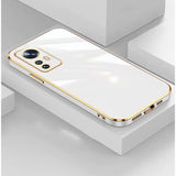 a white and gold iphone case with a gold edge