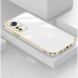 A white and gold iphone case with a gold edge