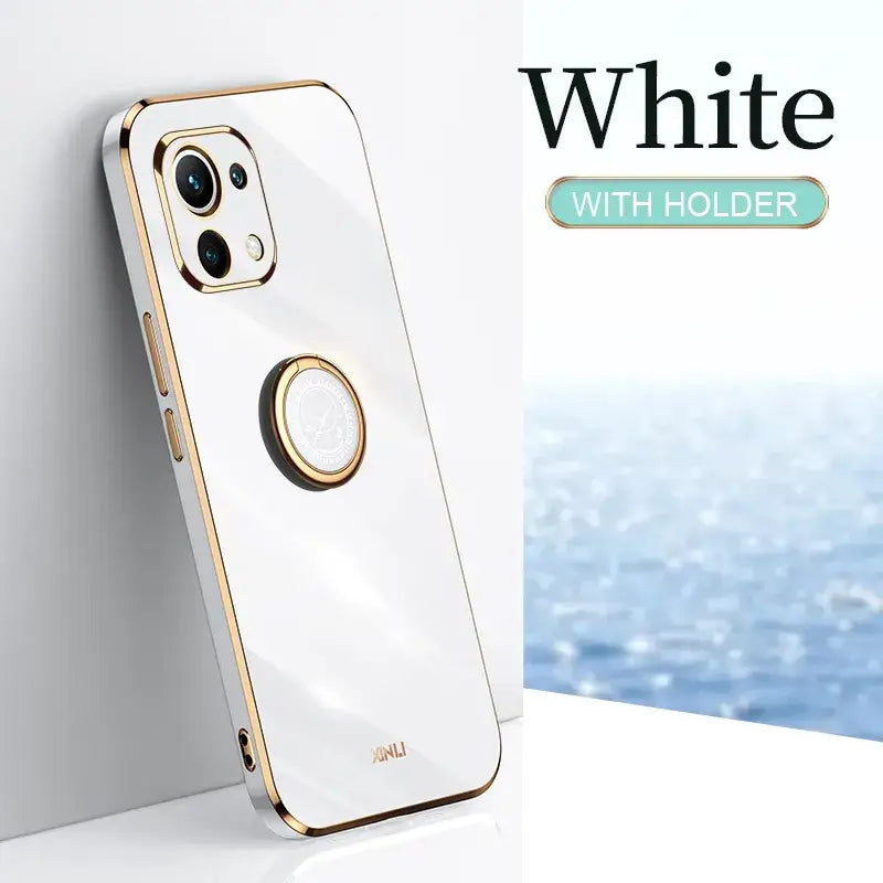 a white and gold iphone case with a white background