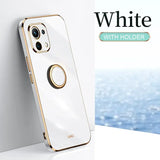 a white and gold iphone case with a white background