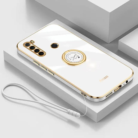 a white and gold phone case with a clock