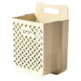 a white and gold plastic basket with a handle