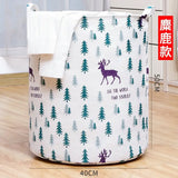 a white and green christmas tree storage bag