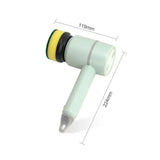 a white and green plastic spray gun with a yellow handle