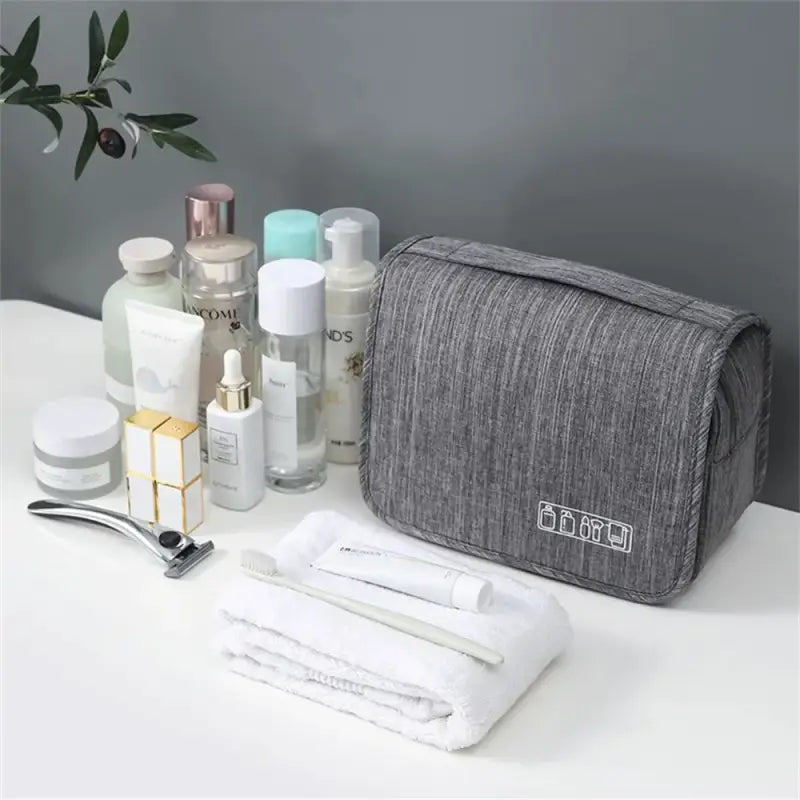 a white and grey bag with a lot of products