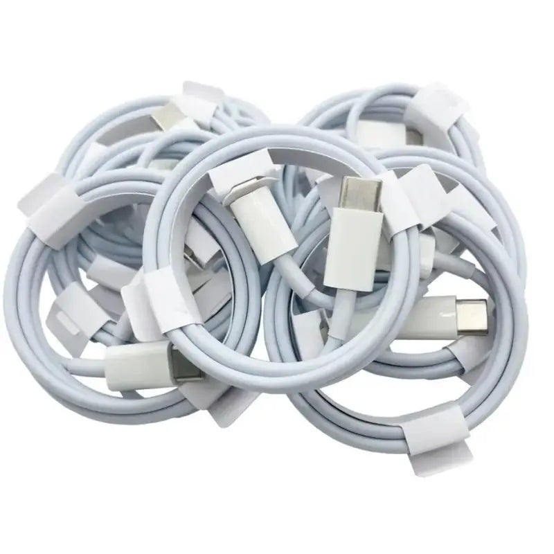 a bunch of white and gray colored usb cables