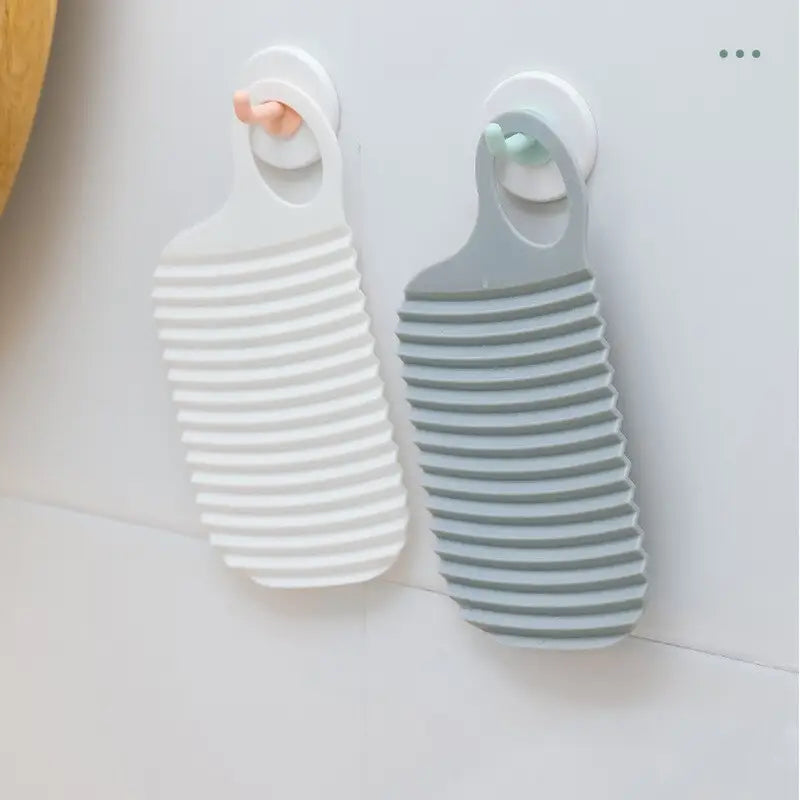 two white and grey striped bottle holders on a white counter