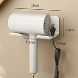 a white hair dryer on a wall