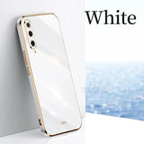 a white iphone with a gold frame and a white background