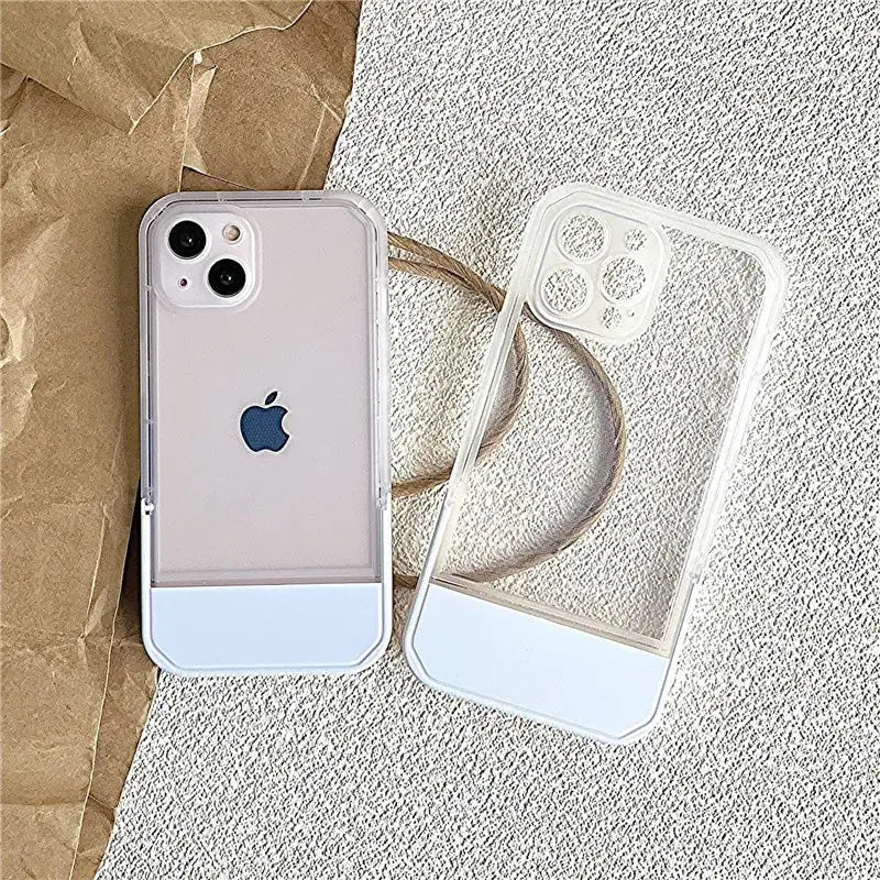 a white iphone case sitting on top of a brown paper