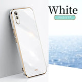 a white iphone case with a gold rim