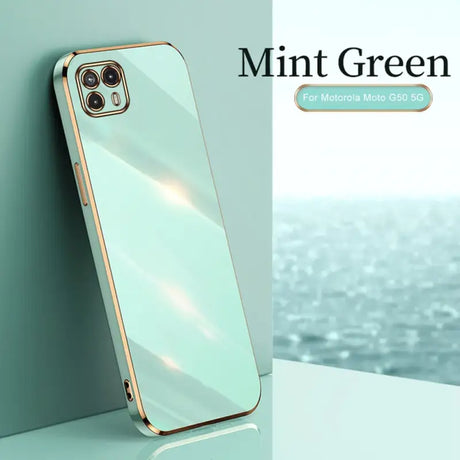 the mint green iphone case is shown on a white surface